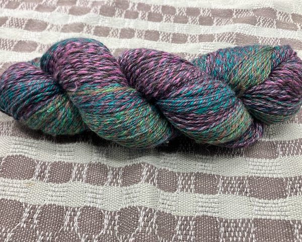 Enchanted - handspun - wool and rose fiber